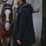 A-Merry-Scottish-Christmas-2023-James-Robinson-Black-Hooded-Coat