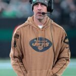 Aaron Rodgers New York Jets Brown Hoodie - PINESMAX