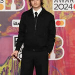 Joe-Keery-BRIT-Awards-2024-Red-Carpet-Black-Bomber-Jacket