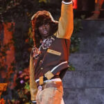 Brit-Awards-2024-Rema-Black-and-Yellow-Varsity-Bomber-Jacket