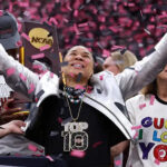 Dawn-Staley-NCAA-2024-Silver-Cropped-Jacket_77ce8c15-f3e4-41d2-9247-b43b302bf0d9