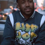 Elsbeth-2024-Jason-Latief-Anderson-Varsity-Jacket
