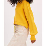 Murder-In-A-Small-Town-2024-Dakota-Guppy-Yellow-Sweater