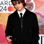 Joe-Keery-BRIT-Awards-2024-Red-Carpet-Black-Bomber-Jacket