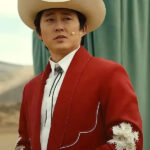 Nope-Steven-Yeun-Red-Suit