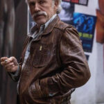 Old-Guy-2025-Movie-Christoph-Waltz-Brown-Jacket