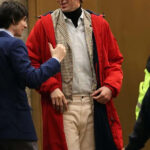 Saturday-Night-Movie-Nicholas-Braun-Red-Hooded-Jacket