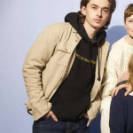 The-Starling-Girl-2023-Austin-Abrams-Beige-Jacket