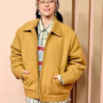 billie-eilish-96th-oscars-awards-yellow-jacket-41007378694400