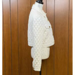 Is-It-Cake-Holiday-2024-Rachel-Bloom-White-Quilted-Jacket