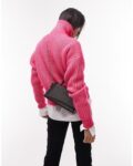 Apple-Cider-Vinegar-2025-Kaitlyn-Dever-Pink-Knitted-Jumper